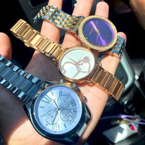 3 brand new michael kors watched. Dark purple face has been worn a few times
